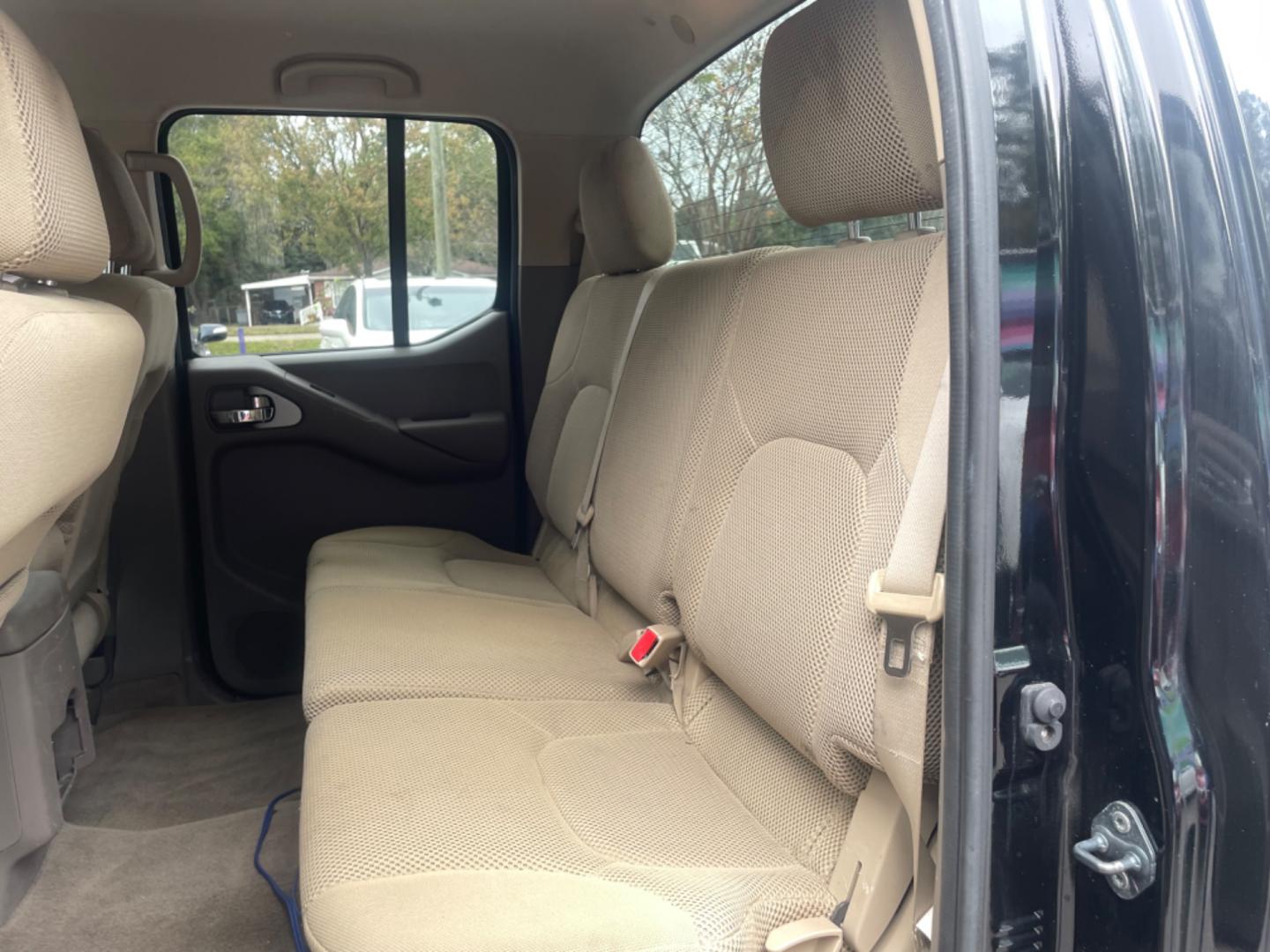 2009 BLACK NISSAN FRONTIER CREW CAB SE (1N6AD07U09C) with an 4.0L engine, Automatic transmission, located at 5103 Dorchester Rd., Charleston, SC, 29418-5607, (843) 767-1122, 36.245171, -115.228050 - Local Trade-in with CD/AUX/Bluetooth, Power Windows, Power Locks, Power Mirrors, Keyless Entry, Alloy Wheels, Bedliner, Tow Package. Clean CarFax (no accidents reported!) 209k miles Located at New Life Auto Sales! 2023 WINNER for Post & Courier's Charleston's Choice Pre-owned Car Dealer AND 2018-2 - Photo#12